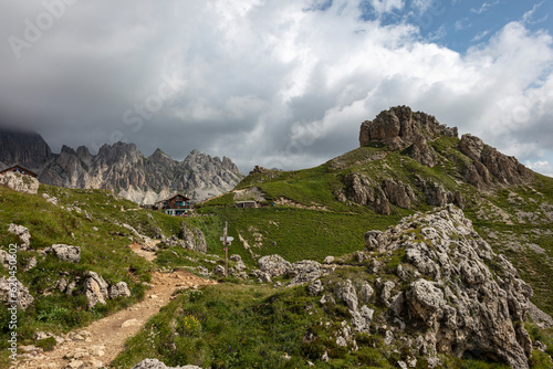 Majarè path / Hirzelweg in the Italian Dolomites at Rosengarten / Catinaccio. Hiking path in the Alps.  photo
