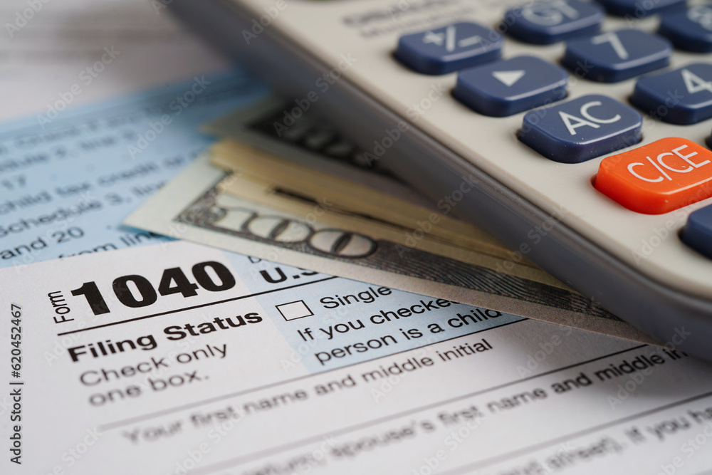 Tax form 1040 U.S. Individual Income Tax Return, business finance concept. Tax form 1040 U.S. Individual Income Tax Return, business finance concept.