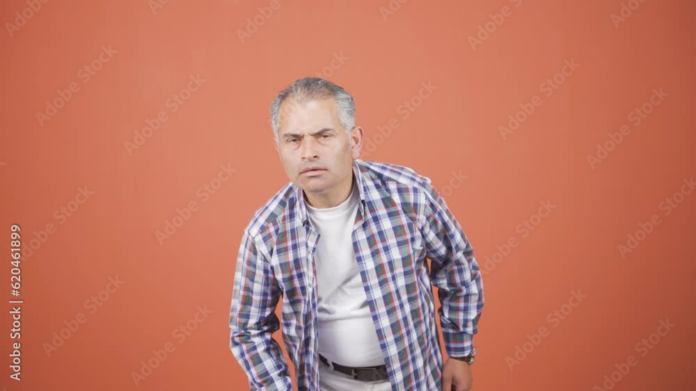Man looking at camera with curious expression. Man looking at camera with curious expression.