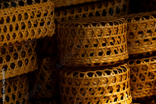 Beautiful handicraft woven bamboo basket. © Phongsak