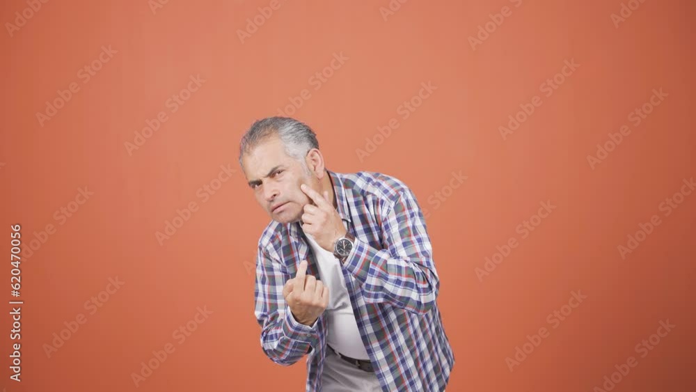 Man with wrinkles and problems on his skin is unhappy. Man with wrinkles and problems on his skin is unhappy.