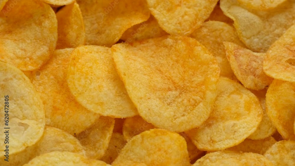 Zoom frame golden potato chips, rotation Zoom frame golden potato chips, rotation