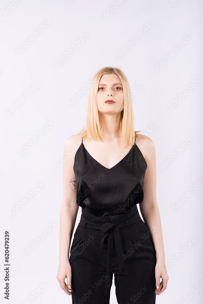 Portrait of an elegant and beautiful blonde girl on a white background Portrait of an elegant and beautiful blonde girl on a white background