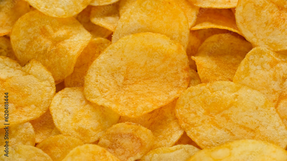 golden potato chips, close up golden potato chips, close up