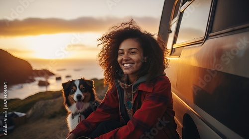 Sea and mountain view background. beautiful smile of tourist woman. she's traveling with dog. they are best friend. she's holding a dog at view point at mountain. morning light and bokeh. photo