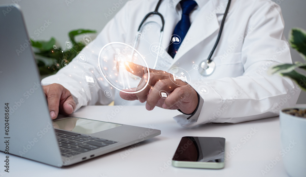 Doctors use smartphones and computers to research medical information. medical concept Doctors use smartphones and computers to research medical information. medical concept