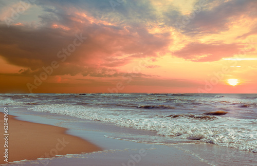 Seascape on a sunny day. The sea with a beautiful cloudy sky. Nature landscape