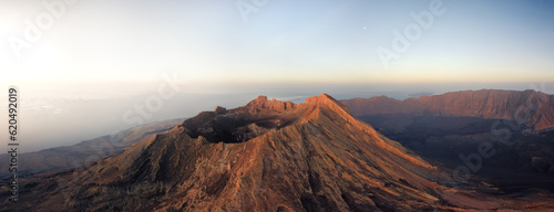 epic panorama of volcanic crater during sunrise