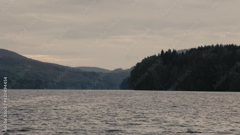 Mountains meeting in the river while the waves moves at 120FPS Mountains meeting in the river while the waves moves at 120FPS