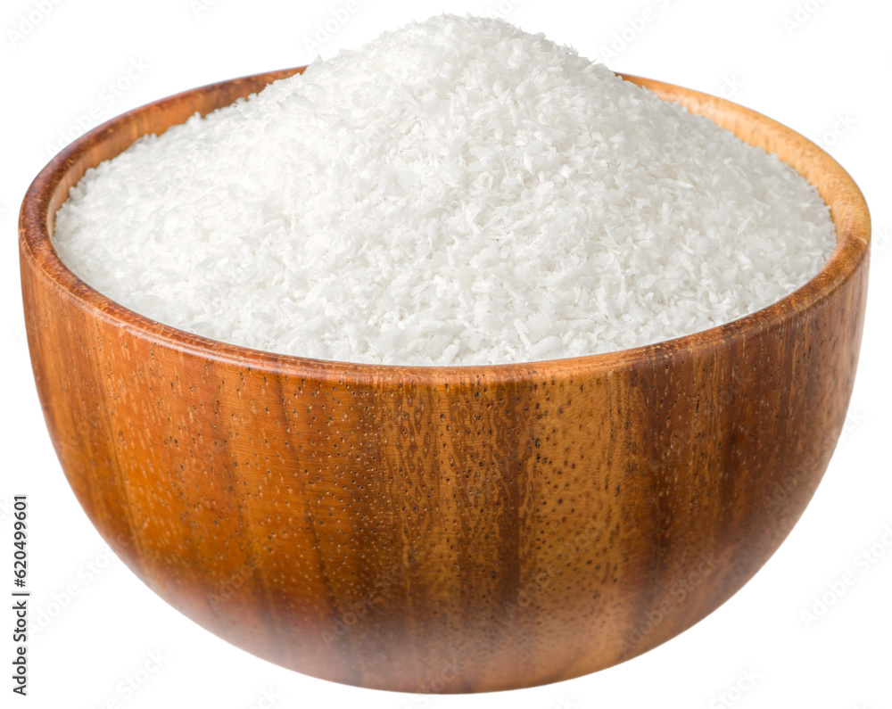 Shredded coconut in the wooden bowl, isolated on white background. Shredded coconut in the wooden bowl, isolated on white background.