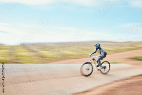 Motorbike, speed and freedom in desert with adventure for sport in competition or blur. Race, dirt bike and action with energy in outdoor for training or rally performance with power in mockup space.