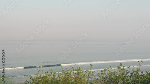 Scenic viewpoint over beach in Bali from hotel rooftop photo