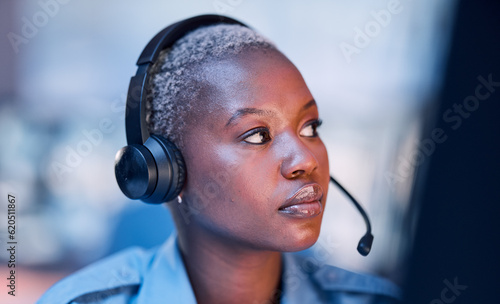 Officer, black woman and call center agent for law or legal service for emergency call and employee in an office. Worker, thinking and security worker talking online or internet for communication