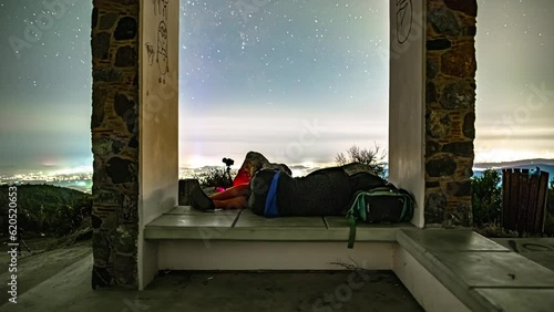 Stars cross the sky above Limassol, Cyprus as a time lapse photographer captures the scene photo