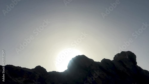 View of the magnificent sand dunes with small mountains from the top at day time. Diffused natural beautiful lighting of sandy hills. desert top view photo