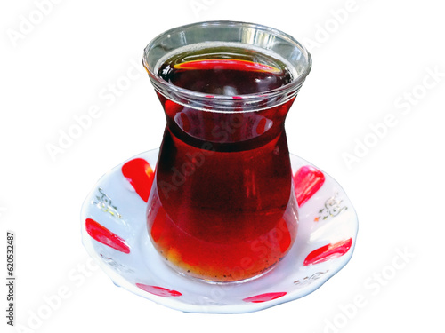 Turkish style thin waisted tea in a glass photo