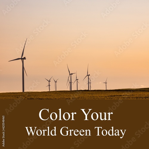 Composition of color your world green today text over wind turbines