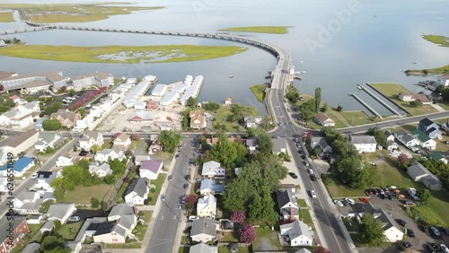Road through the swamps to the Chincoteague bay nature reserve. Aerial view of the road and the reserve photo