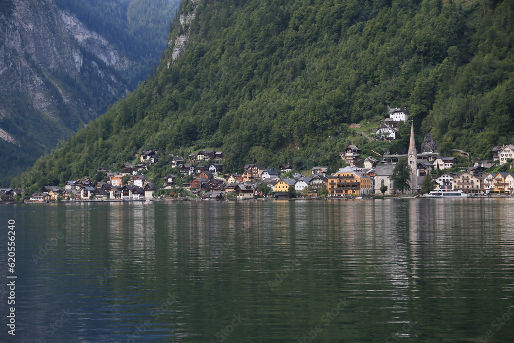 Photo of a lakeside village surrounded by nature, Austria
