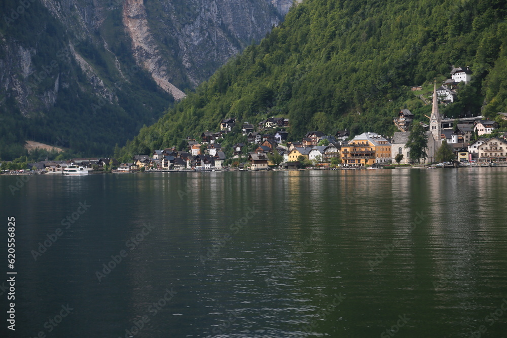 Photo of a lakeside village surrounded by nature, Austria