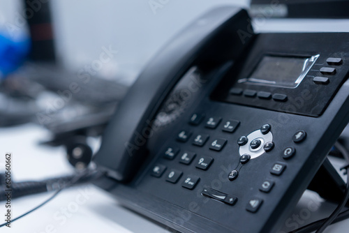 close up telephone landline in operation room at office for contact and hotline concept