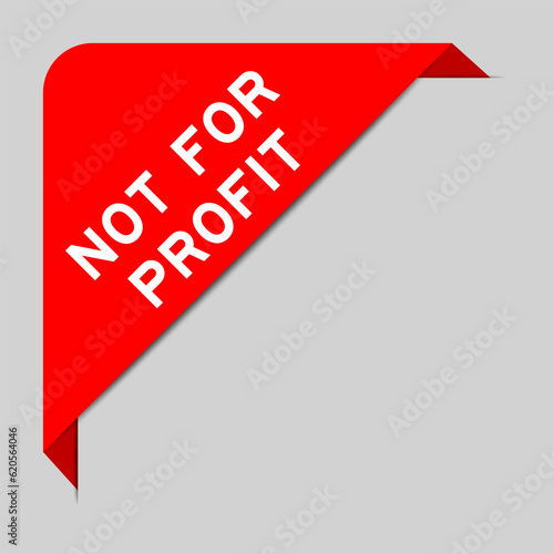 Red color of corner label banner with word not for profit on gray background