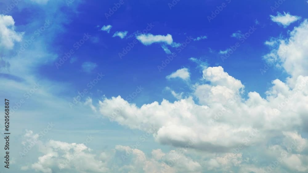 White heap cloud moving on the blue sky in the summer tropical area time lapse White heap cloud moving on the blue sky in the summer tropical area time lapse