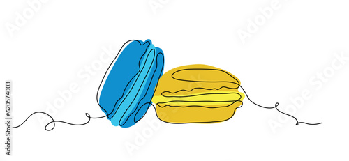 Macaroons cookies one continuous line art drawing vector illustration. Yellow and blue macaroons single line art