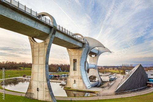 The Falkirk Wheel , a unique rotating boat lift connecting the Forth and Clyde Canal with the Union Canal at Falkirk in Scotland. photo