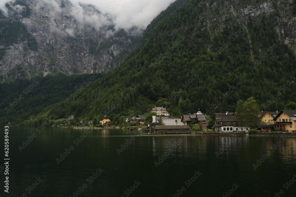 Austria's Scenic Village Enveloped by Majestic Mountains and a Sparkling Lake
