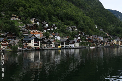 Austria's Scenic Village Enveloped by Majestic Mountains and a Sparkling Lake
