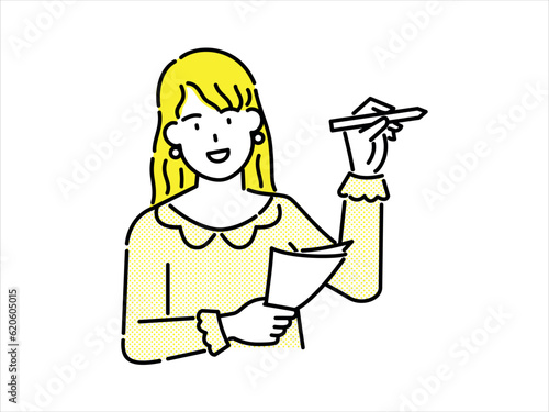 Young female teacher explaining while holding pen and textbook