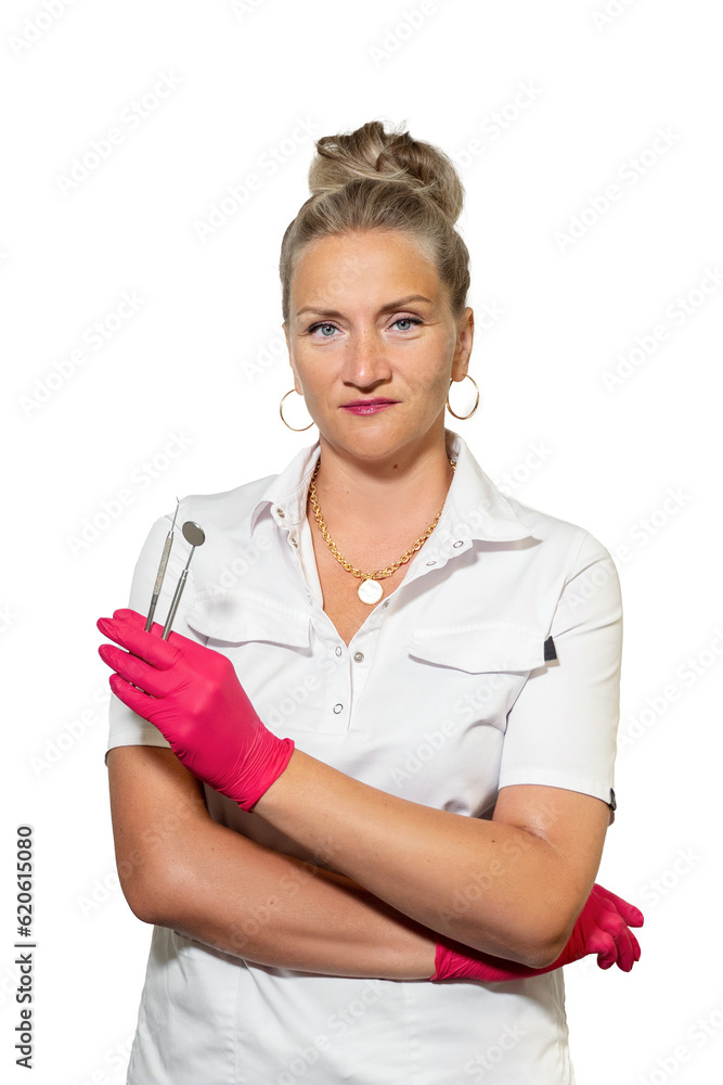 Female dentist hands in medical gloves hold dentistry tools, mirror over white background. Oral hygiene dental instruments, health care, orthodontic treatment vertical