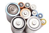 Group of batteries isolated on white background top view.