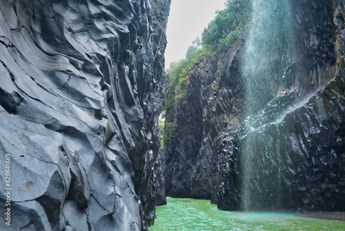 waterfall in Alcantara Gorge in Fondaco Motta, near Catania ,Sicily, Italy