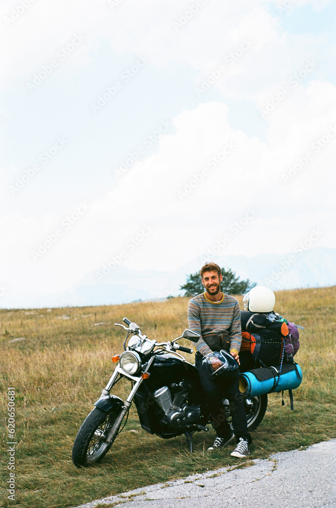 Man on a motorcycle in mountains of Montenegro Man on a motorcycle in mountains of Montenegro