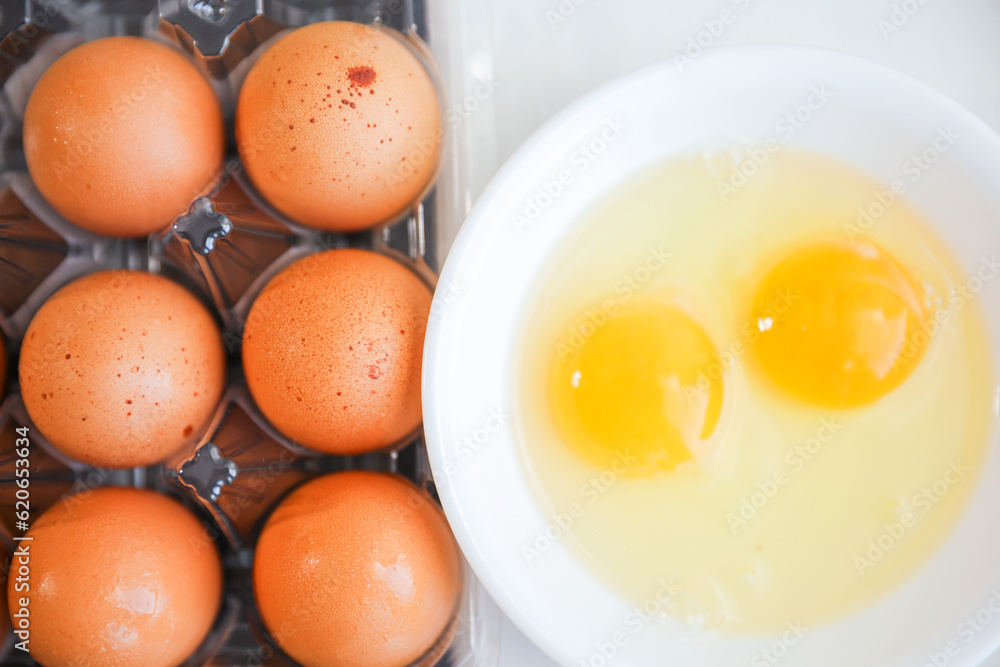 Whole eggs represent vitality and potential, cracked eggs symbolize vulnerability, while yolk represents nourishment. Contextualized against health concerns and rising inflation Whole eggs represent vitality and potential, cracked eggs symbolize vulnerability, while yolk represents nourishment. Contextualized against health concerns and rising inflation