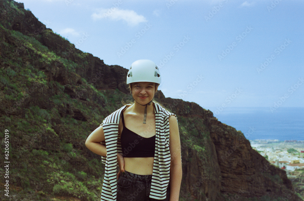 Film Portrait Of Smiling Woman Hiking In Helmet Film Portrait Of Smiling Woman Hiking In Helmet
