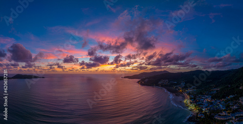 Aerial panorama view scene romantic pink sky on sunset at Patong beach. .abstract nature background..Sunset with bright red light rays and other atmospheric effects. .abstract nature background.
