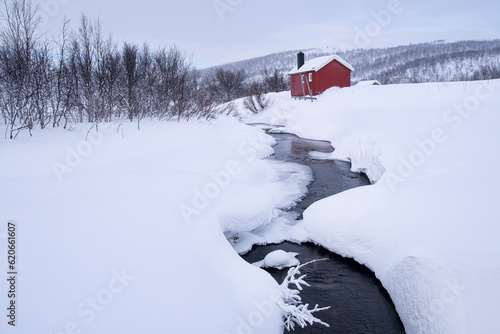Traditional Sami Cabin (Hytte) in winter, near Lake Eoalbmejavri, Finnmark Plateau, Troms og Finnmark, Norway, Scandinavia photo