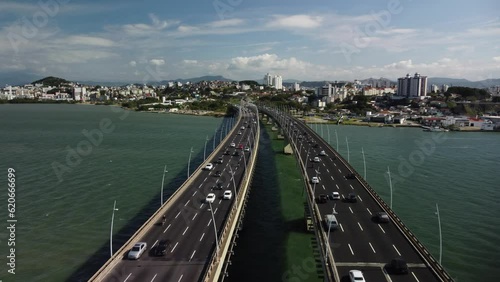 Aerial drone view of Hercilio luz bridge with car traffic.