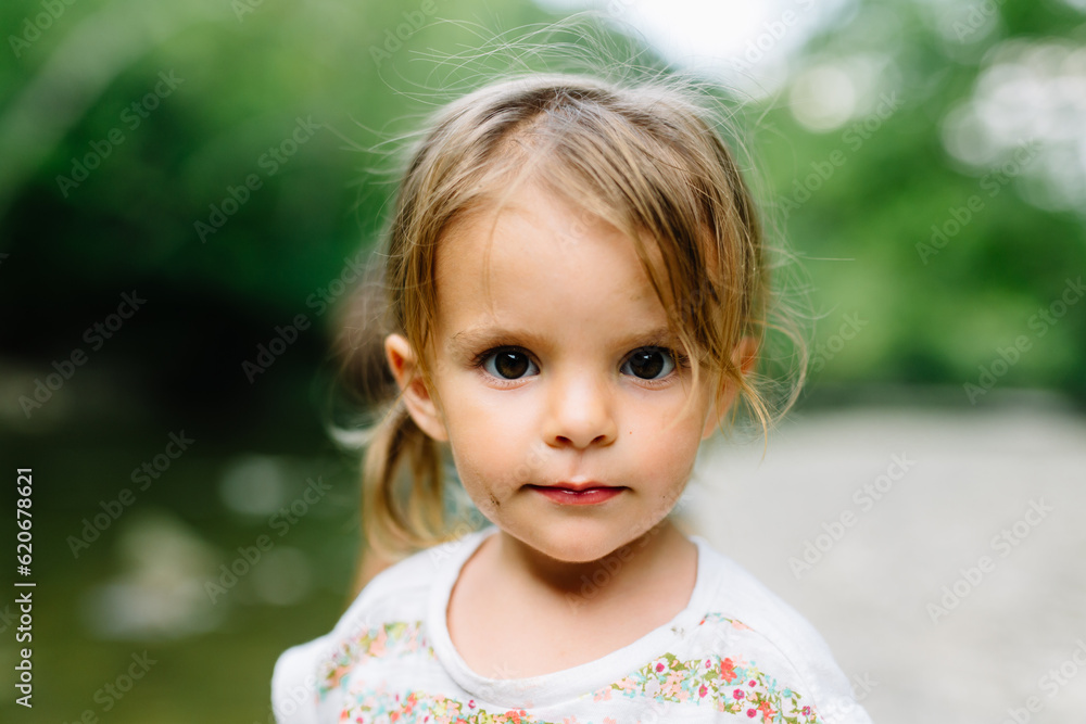 Portrait of young girl in wooded area Portrait of young girl in wooded area