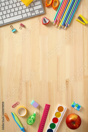 Back to school concept. School stationery on wooden desk table. Flat lay, top view.