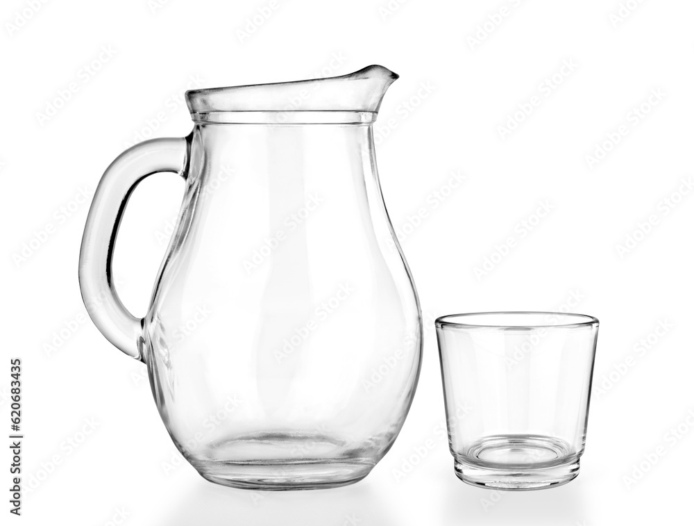 Empty jug and glass on a white background. Empty jug and glass on a white background.