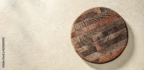 Fototapeta Naklejka Na Ścianę i Meble -  Old pizza board or cutting board on sand stone texture
