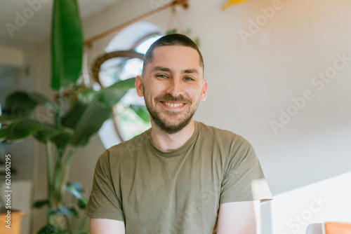 Man with fresh buzz cut at home photo