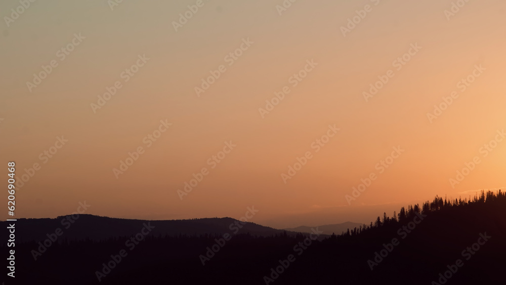 Silhouettes of mountaines at sunset