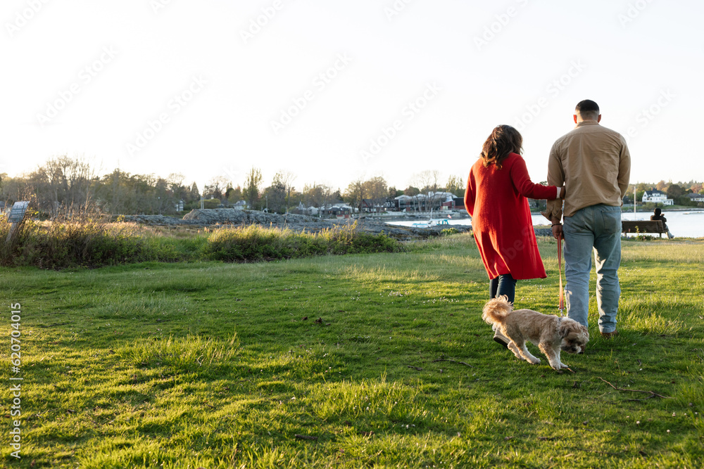 Mother and sonout for a walk together with toy dog. Mother and sonout for a walk together with toy dog.