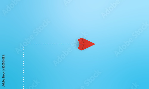 New normal concept with Red paper plane in new direction on blue background. Copy space 