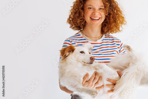 Woman Holding Her Dog